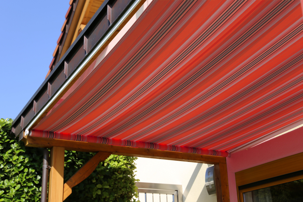 retractable awnings for homes in massachusetts to protect shade and reduce utility bills